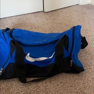 A Nike blue duffel bag